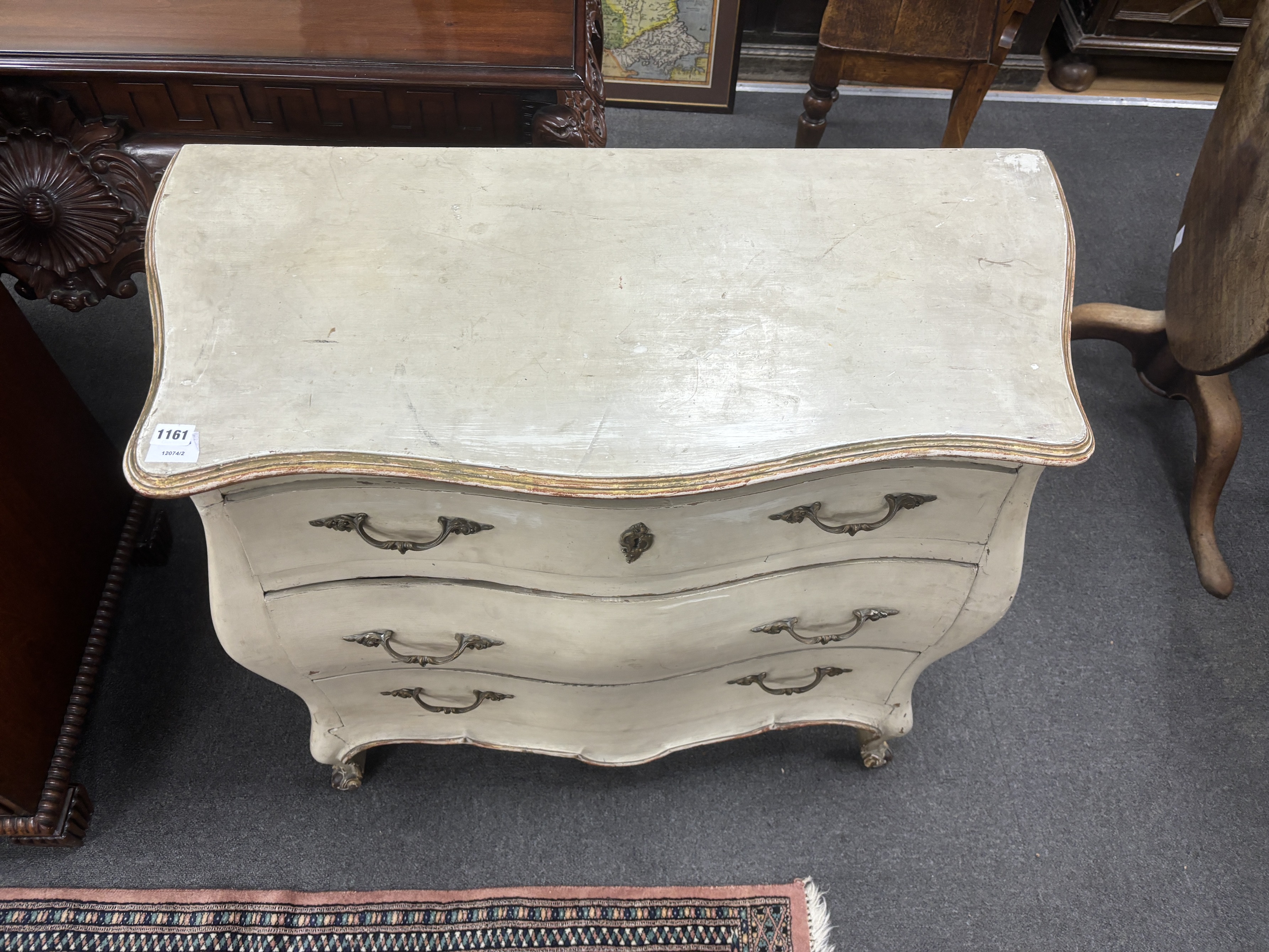 An 18th century style painted pine bombe commode, width 97cm, depth 46cm, height 80cm